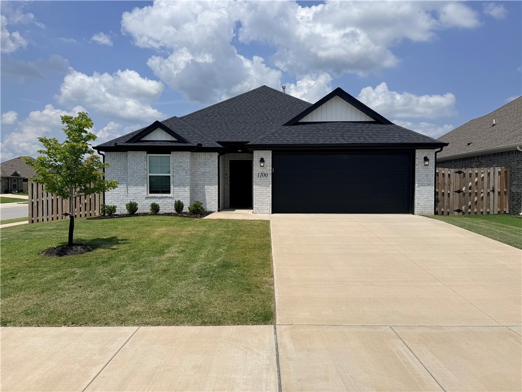 Like new all brick home on a corner lot in a wonderful neighborhood.  Split layout with 3 bedrooms, 2 baths and a 2 car garage.  Open concept layout kitchen, dining area and living room.  The kitchen features Gallery appliances, granite counters, subway tile backsplash and a pantry.  Luxury vinyl plank flooring in the entry and living area.  Tankless hot water heater.  Covered back patio with a screen door.  This is a must see.
