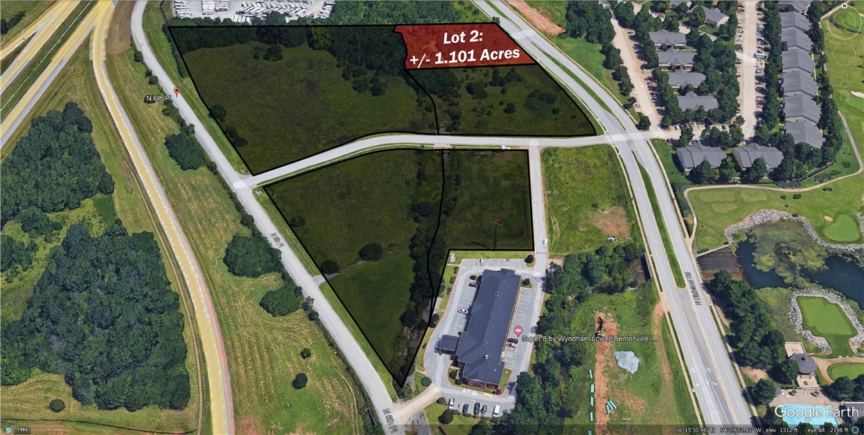 Prime commercial land spanning +/- 1.101 acres offering excellent development potential in a high-visibility location. Featuring  +/- 165' of road frontage along Dixieland St in Lowell, the property is zoned C-2 Urban Thoroughfare Commercial, making it ideal for a quick-service restaurant (QSR), retail or office building, medical facility, and more. Public water and sewer are conveniently located at the street, ensuring easy utility access. Positioned just off I-49, the major interstate system running through Northwest Arkansas with approx. 109,000 VPD, this parcel is perfectly suited for businesses seeking maximum exposure and accessibility.