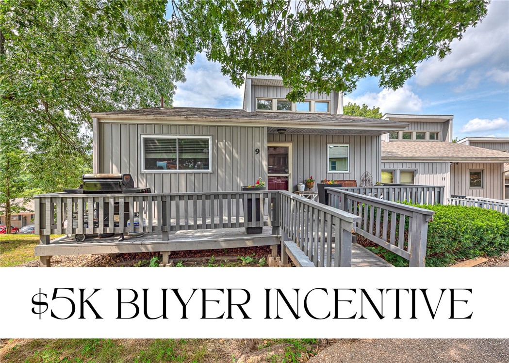 STUNNING END-UNIT TOWNHOME JUST MINUTES FROM LAKE WINDSOR, GOLF, AND SCENIC TRAILS. This beautifully maintained residence offers seasonal lake views and abundant natural light throughout. Ideally located near Kingswood Golf Course, Tanyard Creek Trail, & the well-known Crystal Cave, it provides both convenience & lifestyle. The open-concept design features soaring ceilings, hardwood floors & a bright living area with private patio access—also accessible from all 3 bedrooms. Upper level includes a spacious primary suite with dual walk-in closets, a full bath, and seamless flow between the kitchen, dining & living areas. Downstairs, two generous bedrooms, a flexible bonus room ideal for an office or guest space & a large storage closet. Exterior maintenance is handled by the City of Bella Vista. Seller offering $5,000 buyer credit at closing — use it toward repairs, updates, or closing costs and make the home your own. A great opportunity to add personal touches while securing a solid home in a desirable location.