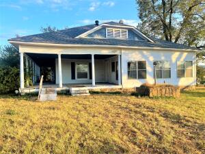 Repair and reap the rewards with this large historical home. 3 Bedrooms possibly 4, 2 baths, with cathedral ceilings, large dining room, kitchen, and large yard with great mountain views and St Mary Church.