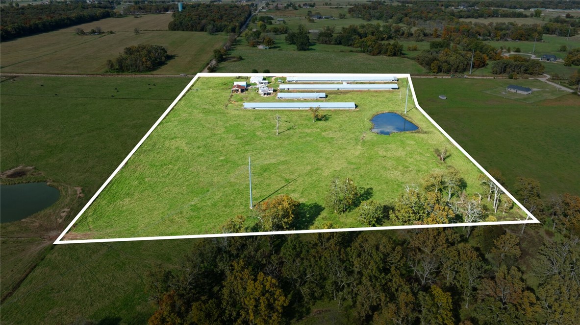 Come build your dream, update the existing, create a subdivision, there are poultry houses (tear down), shop/metal building, a home with opportunity to update or bulldoze to create a new dream! This is a great location with lots of development in the area, almost 20 acres, majority of the value is in the land, however, the house is livable and still has lots to give! 3/2 lots of kitchen area and carport! Come see for yourself!