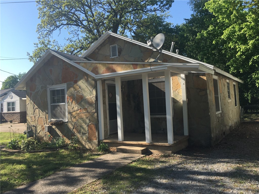 Neat as a Pen.  Two bedroom, one bath in a desirable location close to downtown and shopping.  Kitchen has new cabinets and counter tops, new dishwasher, microwave vent and vinyl flooring.  Appliances include stackable washer & dryer and refrigerator.  Original hardwood floors.  Fresh paint throughout.  8 X 12 storage building with electric in large backyard with lots of shade trees.  Ideal for rental investment or starter home.