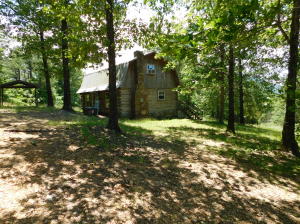 This unique Ozark Mountain Region hunting/recreational land consists of 230 +acres. Awesome views of the surrounding mountains. The real estate includes 2 cabins with electricity and water. The acreage features rolling terrain of timber, native grass, and ponds. It was previously used as a hunting club with cabin rentals.This property is extremely dynamic, offering great interest to both hunting and recreational enthusiasts because of the healthy populations of whitetail deer, turkey small game and trails for ATV or horseback riding. The property is located just 3.5 miles from the Hasty Public Access of the Buffalo National River and just 1 mile to the Little Buffalo River for canoeing and fishing.