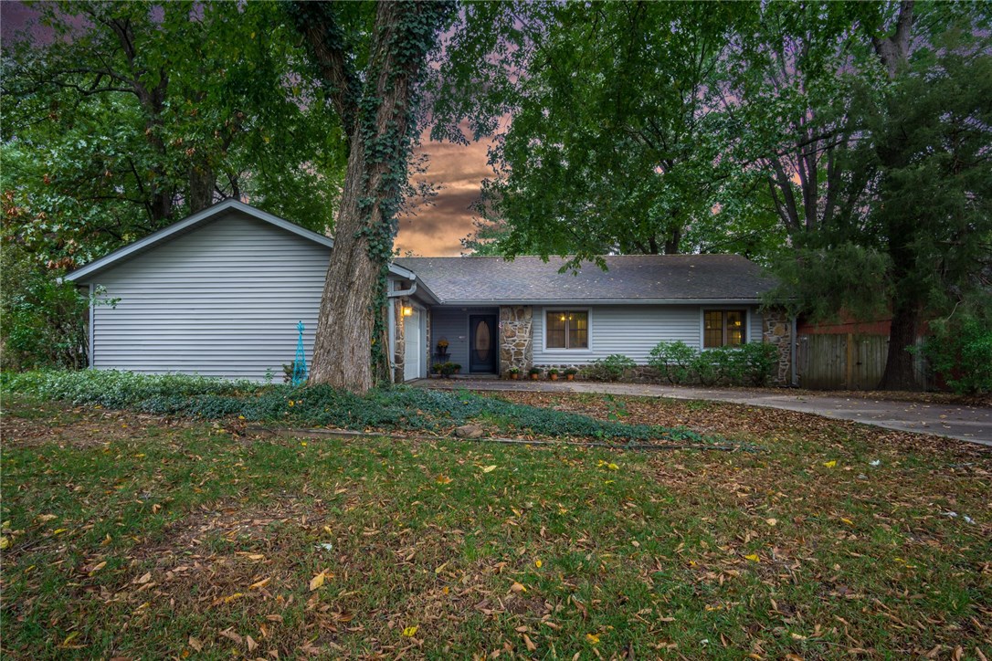 Charming 3 bedroom 2 bath home in a great central location with a new roof! Enjoy this awesome floor plan with large rock wood burning fireplace, great size living room, and tons of natural light. Kitchen features a lot of cabinet storage, eat-in kitchen area with access to the backyard and ample counter space. Some of the rooms completely remodeled. Large laundry room and two car side load garage. Large Master Bedroom with walk-in closet and $2,000 allowance to remodel the master bathroom!! Deck overlooking large level fenced in backyard and tons of mature trees!