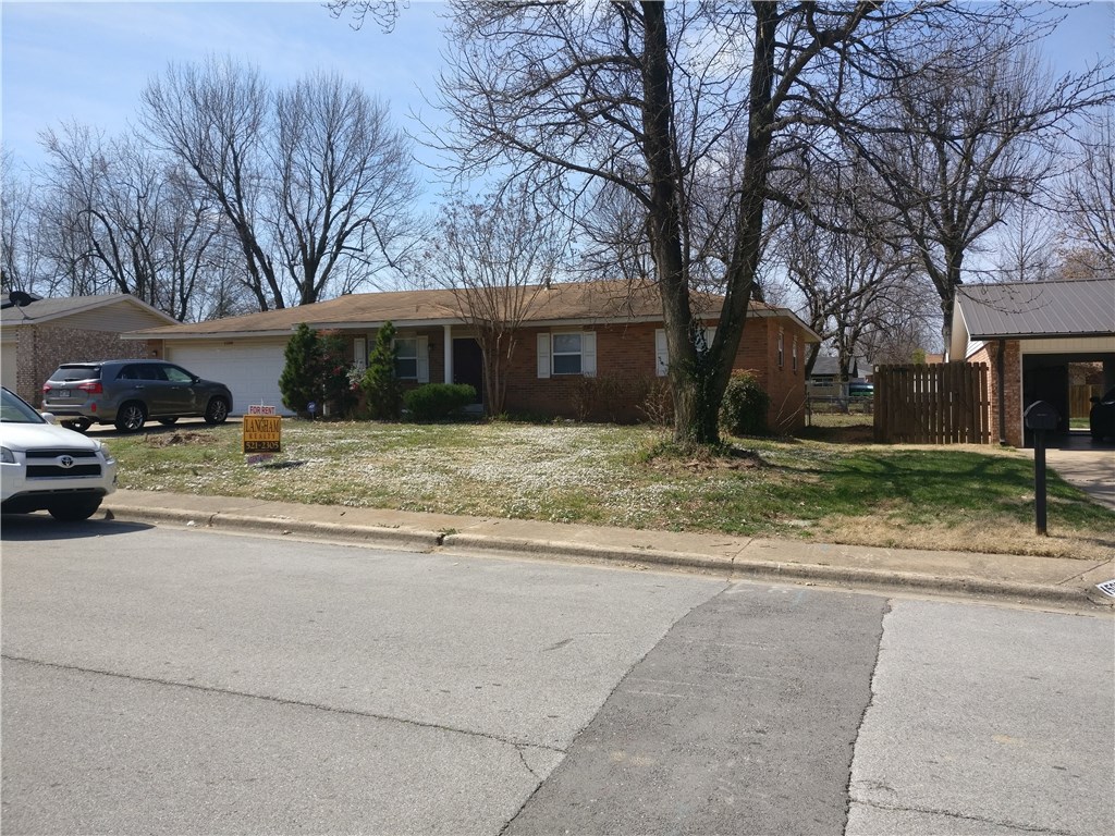 House is conveniently located near Elm Springs Road and i-49 interchange.  Extra large two car garage. Refrigerator and washer and dryer provided about 1300 heated sq feet. $25 application fee per adult. Seeking a credit score 600 minimum on applications. No interior smoking allowed. Pets negotiable.