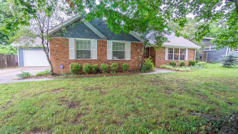 Welcome home to this spacious and beautifully maintained 5-bedroom home in the heart of Fayetteville offering room for everyone to live, work, and relax in comfort. The desirable floor plan features the owner’s suite on the main level along with a spacious guest bedroom, perfect for multi-generational living or a home office setup. Enjoy multiple living spaces including a welcoming front living room and an oversized den ideal for entertaining, movie nights, or game days. Upstairs you’ll find two large identical bedrooms plus an additional guest room and abundant closet storage throughout. The huge Solarium overlooks a private backyard retreat complete with a swimming pool, and spa, chicken coop, garden space, extra storage building, and wooded backdrop that creates a peaceful country feel right in town. Located on a quiet no-through street in a prime central Fayetteville location convenient to shopping, dining, the University of Arkansas, and historic downtown Fayetteville.