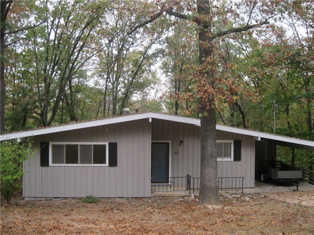Gorgeous home in the Avondale Subdivision. Totally remodeled with laminate plank flooring, 2 bedrooms with 1/2 bath in Master and full bath in hall. Huge deck overlooking wooded area. Carport with storage area.
