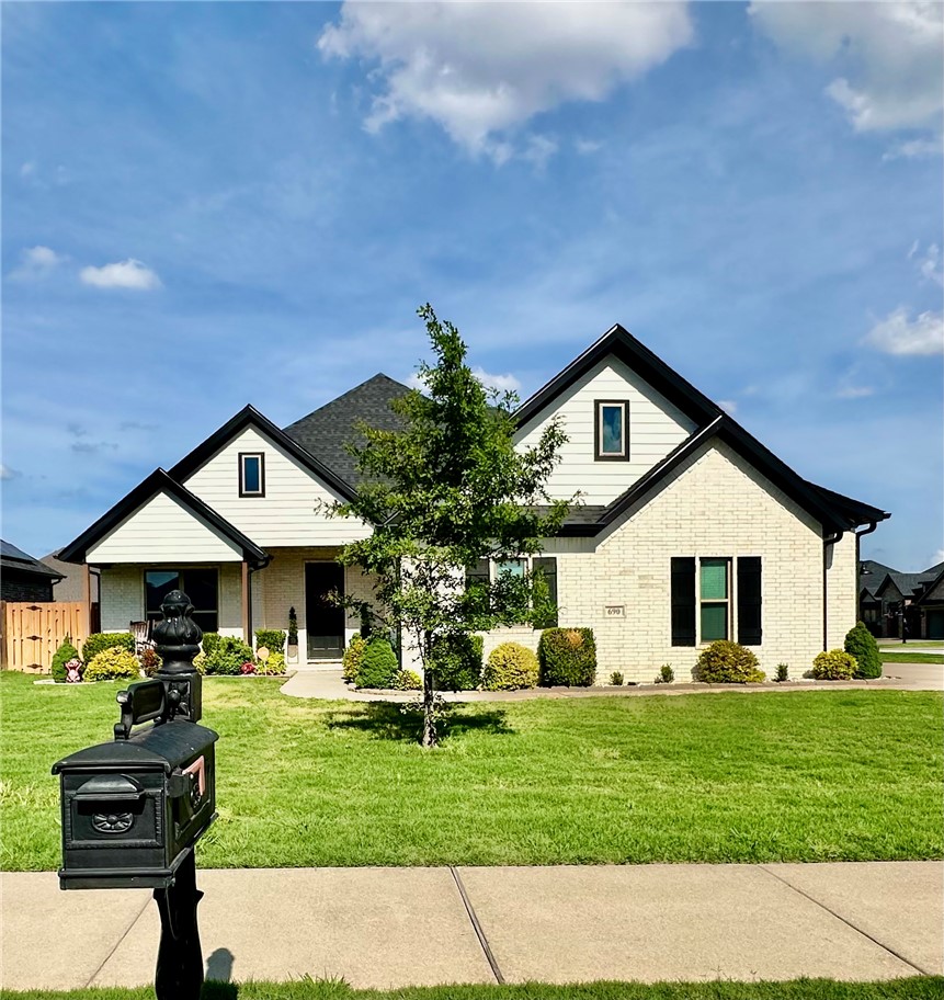 Welcome to this beautifully maintained, one-owner home in the Liberty Estates subdivision in Tontitown. Situated on a spacious corner lot, this 4-bedroom, 3-bathroom home offers 2,550 sq ft of thoughtfully designed 2-story living and also includes a versatile bonus room. The walk-in pantry, multiple walk-in closets, and covered back porch are additional highlights. New roof March 2026. Neighborhood pool access May-September. Shaw Elementary, Helstern Middle School, Central Junior High, Har-ber High School.