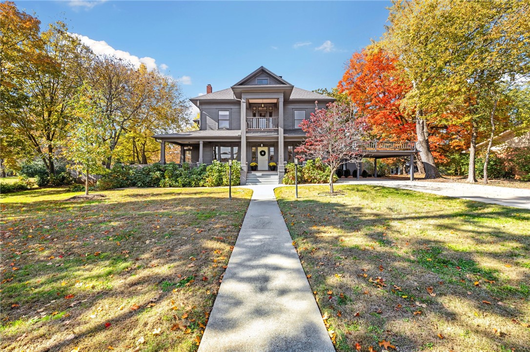 Step into a piece of Fayetteville history- meticulously reimagined for modern living. This iconic, fully renovated historic home combines restored architectural elements with high-end custom finishes. Situated on a rare .6-acre lot in the heart of town, the property offers exceptional flexibility: enjoy the grounds as your own secluded retreat, or use the additional lot to create a pool house or second dwelling. Inside, the home features six true bedrooms, including two spacious primary suites, ideal for multi-generational living or luxurious guest accommodations. A separate studio apartment provides endless possibilities- perfect for in-laws, your home office, or even rental income- while a dedicated study and multiple flex spaces adapt effortlessly to your lifestyle needs. Spend your weekends walking to Wilson Park or the Fayetteville Farmers Market. If you've been looking for a historic estate in the center of town and zoned for Root Elementary, you must see this rare opportunity!