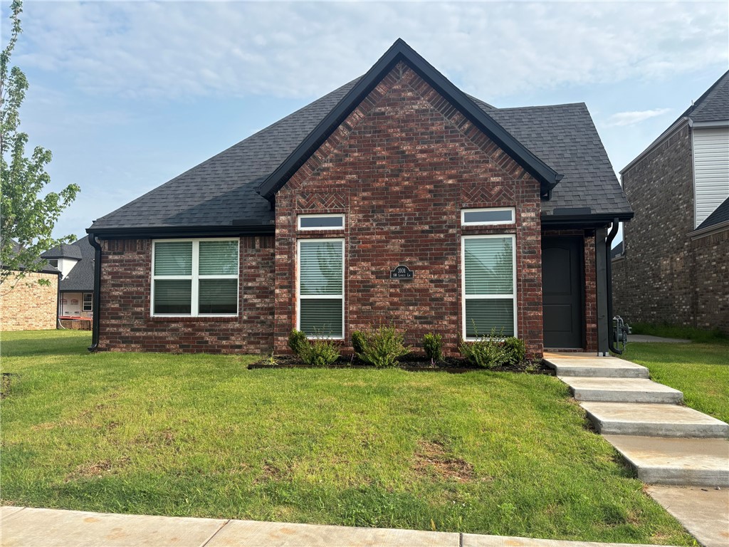 This beautiful four-bedroom, three-full-bath home is located right in the heart of Bentonville. It features luxurious LVP flooring throughout the main living areas, with tile in all bathrooms, carpet in the bedrooms and a staircase leading to the second floor. The home is thoughtfully laid out with two bedrooms on the first floor and two additional bedrooms plus a bath on the second floor, one of which has direct access to the bathroom. The primary bedroom includes a spacious shower for added comfort. 
The kitchen stands out with elegant granite countertops and a desirable gas range, making it a chef's delight. The home is also equipped with a washer, dryer, and refrigerator, and it includes a spacious laundry room. There's a convenient drop zone right by the entrance from the two-car garage, perfect for hanging backpacks, keys, and coats.
With its low maintenance fenced in yard and proximity to a local school, this home is ideal for families looking for comfort and convenience.