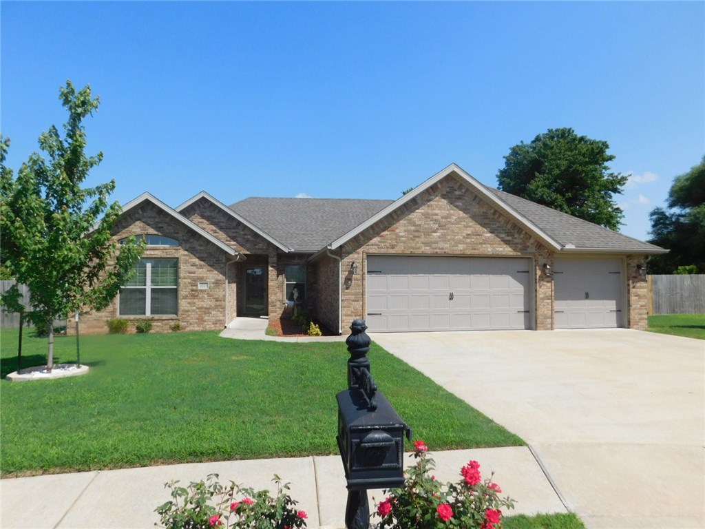 Very, very nice 2,048 SF home in Farmington city limits. It features a great split plan, 4 BR, 2 BA, 3 car garage, granite, crown, gas fireplace, 2" blinds & a huge utility room. It is all brick & was built in 2010. 10x16 brick storage shed. Garage is wired for 220. Landscaped, fenced yard. One of the largest lots in this very nice, quiet subdivision located across the street from Valley View Golf Course. Beautiful mountain views. Prairie Grove schools
