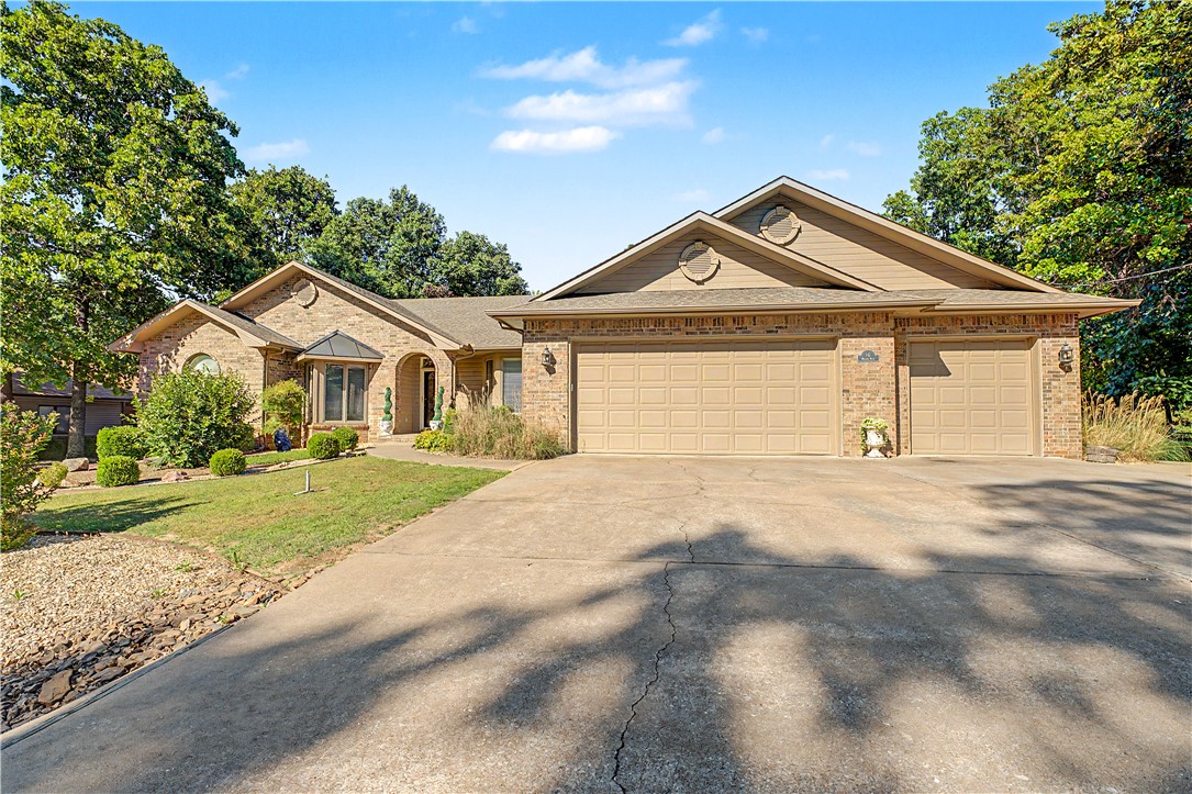 Welcome to the good life...a life of ease and comfort. A life filled with the joy of having nature and golf right in your very own private backyard. This 3 bedroom, 2 bath home is just a short wedge shot away from the 10th green at Highlands Golf Course. That also means you are only 500 yards away from the Clubhouse and Highlands Pub and Restaurant. The Sunroom has been completed with floor to ceiling windows..and it's climate controlled so that you can enjoy it year round! The Kitchen has been updated with granite countertops and tile backsplash. There's a Breakfast Nook where you can enjoy birds and birdies...plus there's a Formal Dining Room. You will love entertaining your friends and family both inside and outside. The landscaping is professionally done and even includes a sprinkler system. Washer/Dryer and Refrigerator convey! The 3 car garage has an extra space for storage or a workshop. This one has it all and is waiting for you to call it home.