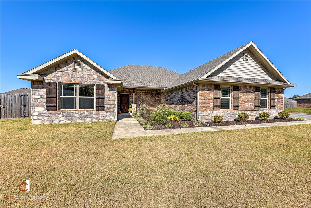 Spacious home on a corner lot... open floor plan, 3 car garage, and massive back yard! This single owner, all brick, 2027 sqft 3 bed 2 bath with its nice high ceilings, open and split floor plan, and covered back porch make this a great home for entertaining friends and family. Master closet gives access to laundry room for your convenience. Brand new garden tub in Master bath. If thats not enough, there’s a built-in Storm Shelter to keep your family safe!  Its been given a fresh coat of paint inside including the kitchen cabinets and is ready for you to see it and make it yours!