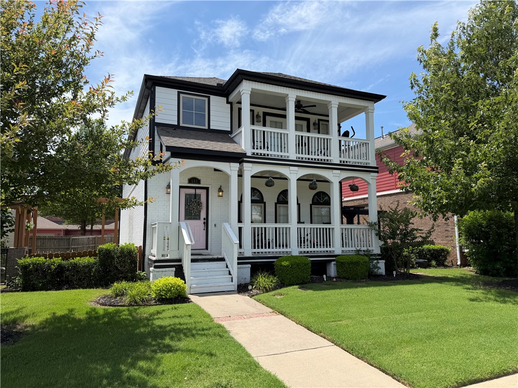 Ideally located just minutes from the University of Arkansas with quick access to I-49, this inviting 3-bedroom, 2.5-bath home combines convenience, comfort, and beautiful views. The open-concept floor plan is filled with natural light, creating a warm and welcoming atmosphere throughout the main living spaces. Step onto the balcony to take in stunning sunrise views and seasonal mountain scenery, especially vibrant during the fall months. The spacious patio and firepit area provide the perfect setting for entertaining guests or enjoying quiet evenings outdoors. Upstairs, you'll find all three bedrooms along with a conveniently located laundry area, keeping the main level dedicated to everyday living and gathering.