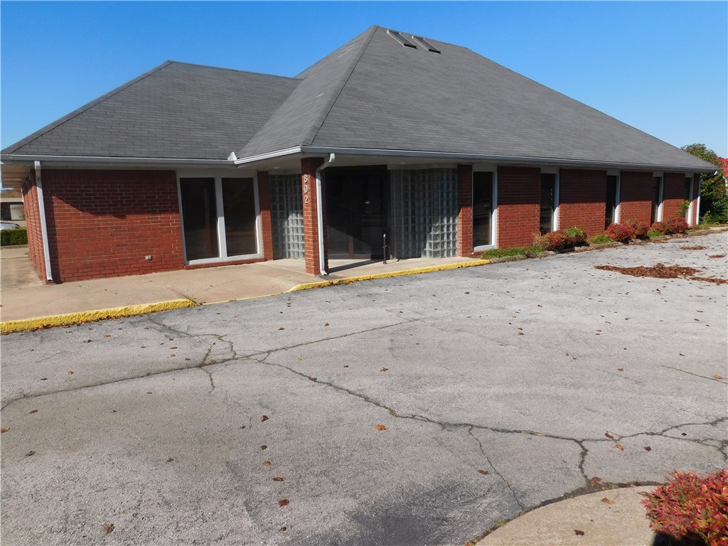 1 Block from Hwy 71B. Waiting/Reception area. Numerous offices/exam rooms. Great for Office or Medical. Ample parking. MG lease type. 3500SF. $14.00PSF.