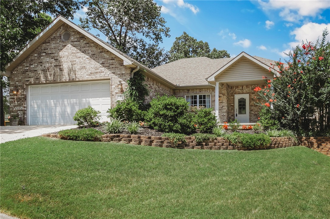 Welcome to 1 Totton Lane — a thoughtfully crafted home that delivers exceptional space, comfort, and value in one of Bella Vista’s most sought-after neighborhoods. The house sits on the corner of a quiet cul-de-sac so no through traffic. Just moments from the Metfield Rec Center and Golf Course, and nestled between Lake Brittany and Lake Ann, this property offers the perfect blend of peaceful residential living and convenient access to trails, lakes, and outdoor recreation. Decals in game room is decals that are easily removed. The large fenced yard provides an ideal setting for kids, pets, or gatherings, while the spacious finished out walk out basement offers flexible use as a playroom, media room, and home office. With solid construction, a smart and functional layout, and serene surroundings, this home stands apart from many newer builds at a higher price point. Move-in ready and perfectly situated, it’s a rare opportunity to enjoy the best of Bella Vista living — quality, comfort, and room to grow.