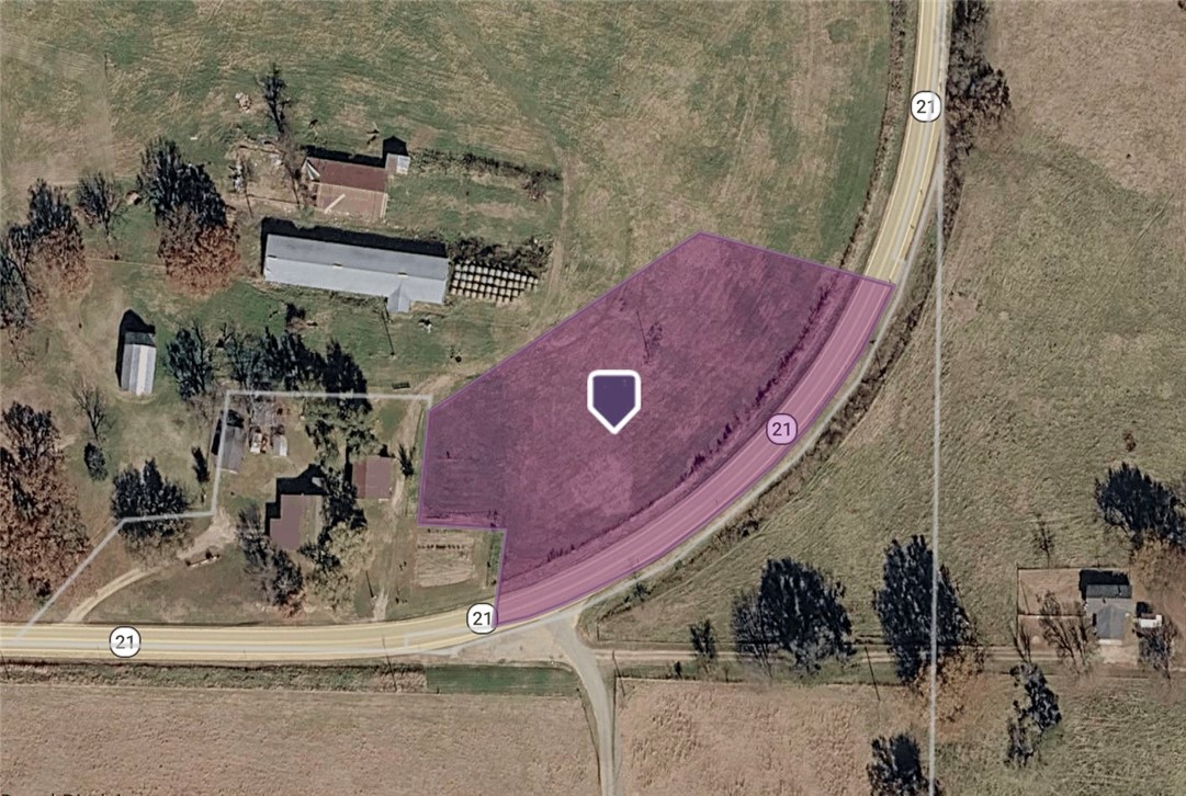 This 2.04-acre residential lot on Highway 21 N in Berryville offers a great opportunity to create your ideal property in a peaceful Arkansas setting.

The property already has electricity and public water available, helping simplify the building process. A septic system will be required, allowing flexibility in planning your future home layout.

With over two acres of land, you'll have plenty of space for a home, shop, garden, or outdoor living area while still enjoying the natural beauty of the Ozarks. The highway frontage provides convenient access to town while maintaining a country feel.

This property is perfect for buyers looking to build, investors seeking land opportunities, or anyone wanting extra space in the Berryville area.