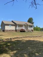 Enjoy the view of the mountains from this super cute 3 bedroom 2 bath home sitting on 4.7 acres. Perfect for horses or just having some extra elbow room. This beautiful home features a spacious living room with a vaulted ceiling, hardwood and ceramic tile flooring, and a separate laundry room and separate oversized pantry. The 35x25 shop with 14' side walls is perfect for the handyman and extra storage space. The home was built in 2012 and is in great condition. Come see!