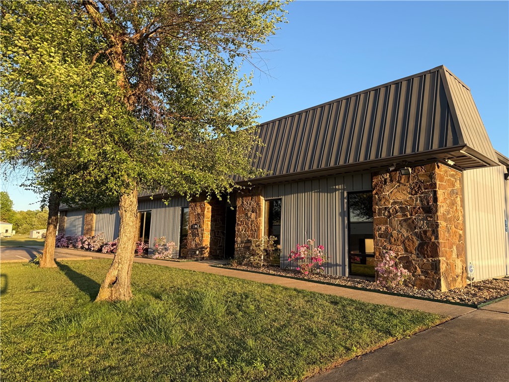 Light Industrial & Manufacturing warehouse in Stephens Industrial Park. 1 10 x 12 grade level door with 14' side wall; 25 surface parking spaces; 3 phase electric;  1 mile from I-540; 1/2 mile from Hwy. 71 South & .3 mile from Hwy. 45.  also for lease for $5,500/mth;