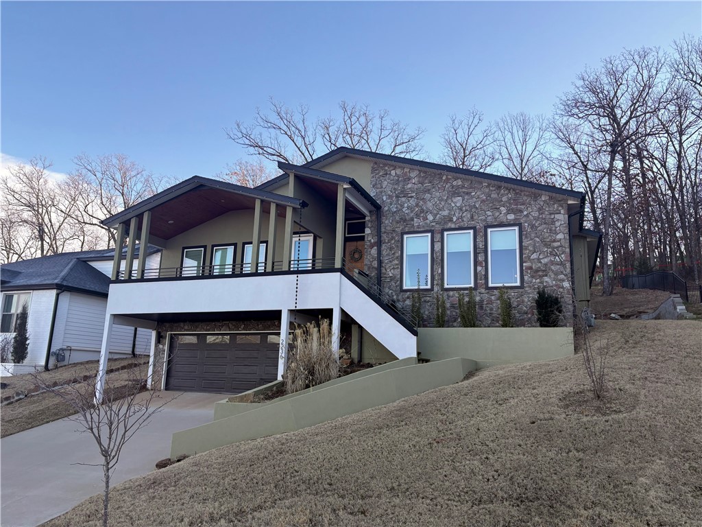 This 3-bedroom, 2.5-bath home offers 2,535 sq ft of modern comfort in one of Fayetteville’s most peaceful and convenient neighborhoods. Thoughtfully designed for both relaxation and productivity, this home features a bright, contemporary interior. Step into a modern kitchen with clean finishes and ample storage, flowing seamlessly into the open dining with sunken living room and a large family/bonus room, perfect for entertaining or unwinding. Outdoor living shines with a covered back porch overlooking a quiet setting, plus a charming west-facing front porch that captures beautiful sunsets and warm evening light. Located just minutes from Fayetteville’s top amenities, shopping, dining, and schools, this home blends tranquility with accessibility.
