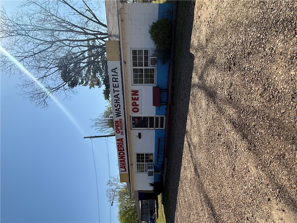 Income-producing laundromat located in the heart of town with excellent visibility and high traffic exposure. Situated next to apartment complexes, providing a built-in and consistent customer base. New Roof was installed 2025.