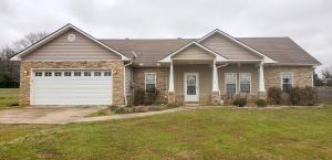 Gorgeous stacked stone 3 bedroom, 2 bath home with a split bedroom floor plan on 0.75 acres. 12' cathedral ceilings in living room, 9' ceilings throughout, and open floor plan make this home feel spacious and welcoming.  Several new black stainless appliances including a built-in convection oven above range. The master suite features 2 large walk-in closets,  garden tub, walk-in shower, and large double sink vanity.  The expansive backyard includes a pergola-shaded stamped concrete patio, above ground pool with all equip surrounded by a large deck, all fully fenced.  The remaining ~.25 acre of the backyard is perfect for a Shop or flag football.  This beauty won't last long, call for your private show today!