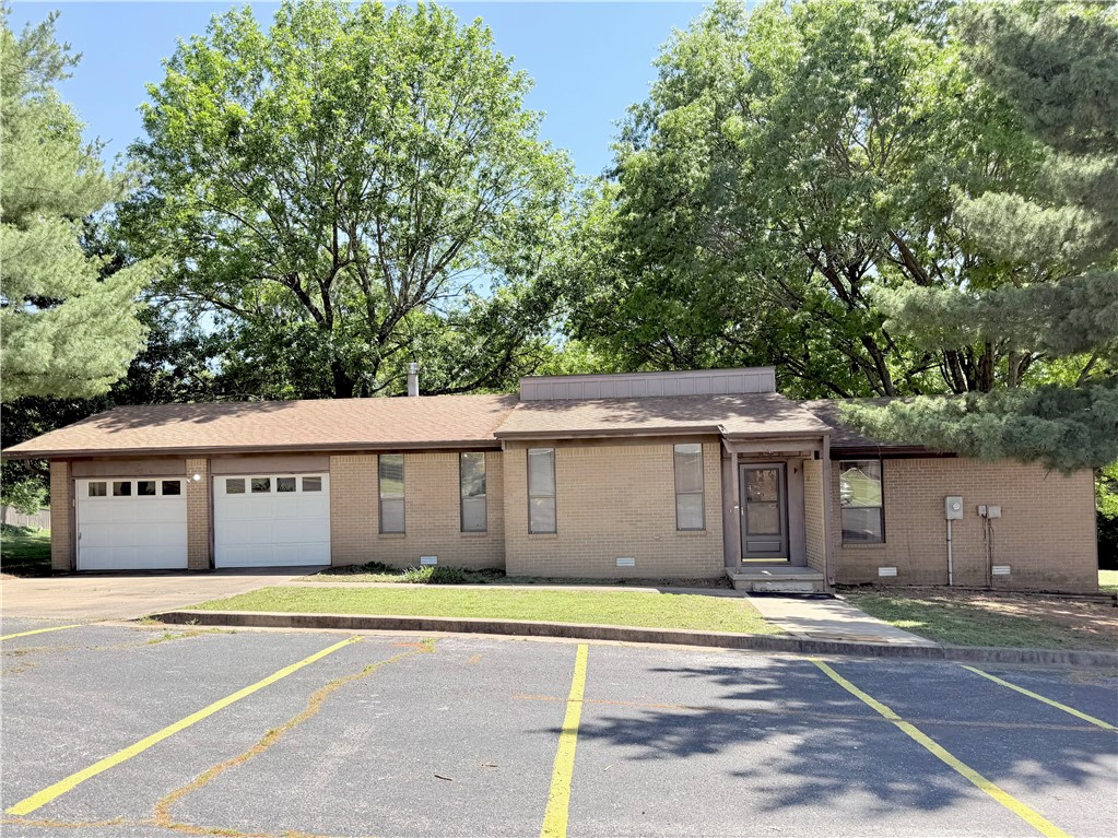 Conveniently located just minutes from the University of Arkansas, this spacious 4 bedroom, 2 bath rental offers approximately 2,030 sq ft of comfortable living space in the heart of Fayetteville. Featuring a functional layout with generous bedrooms, multiple living areas, and plenty of room to spread out, this home is ideal for roommates, students, faculty, or anyone wanting quick access to campus and city amenities. Enjoy nearby walking and biking trails, parks, dining, shopping, and entertainment, all just moments away. With easy access to major roads and the U of A, this property combines space, convenience, and location in one hard-to-find rental opportunity. Available now!