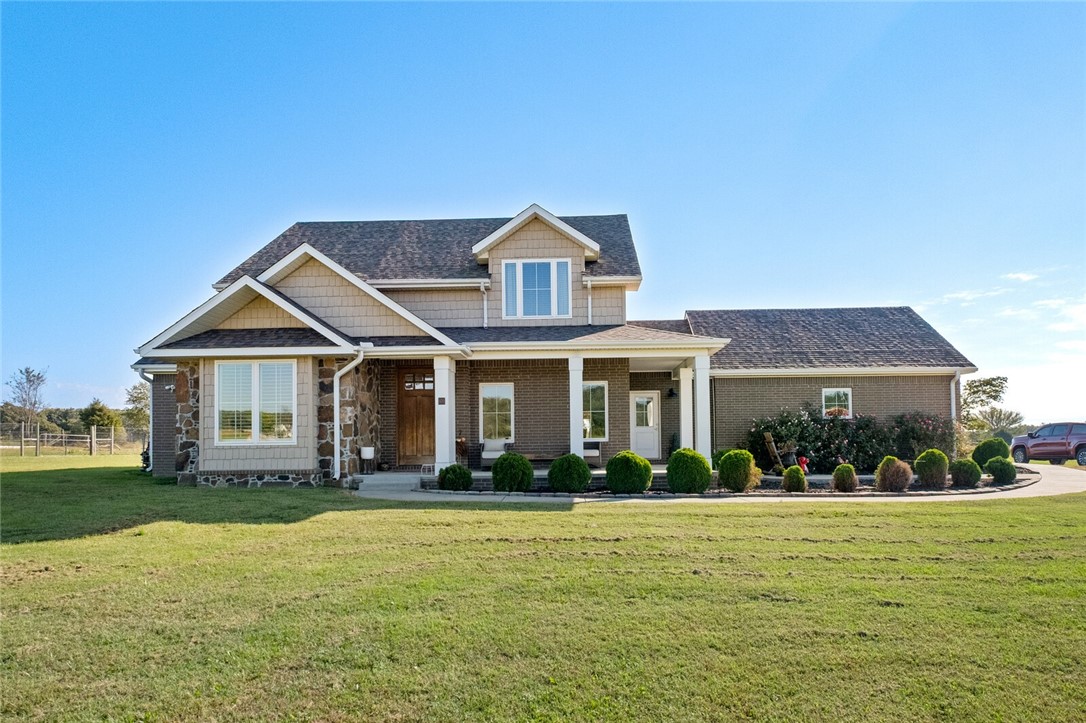 Come and relax on this sprawling 6.6 acre space of quiet tranquility. New Roof and water heater in 2025. This two story modern farmhouse has 4 bedrooms, 3 and 1/2 baths, office, formal dining, built in tornado shelter (inside home), open Living room to kitchen floor plan with vaulted ceilings. Stainless steel appliances, gas cooktop, double oven, large pantry, quartz countertop with bar seating and eat-in kitchen nook. Abundant windows allowing bright natural light shining in. Covered porch overlooking the beautiful natural landscape. Large covered patio with view of new inground vinyl saltwater pool. On the North side of property sits 2 pole sheds, one closed in for your choice of hobby farm animal (currently small friendly goats inhabit it). Huge 60x40 Shop  with over head and side door on concrete pad to host equipment or an outdoor get together. Off Habberton road just a few min to see Lake or 5 min to Hwy 45 for convenient access. MUST SEE