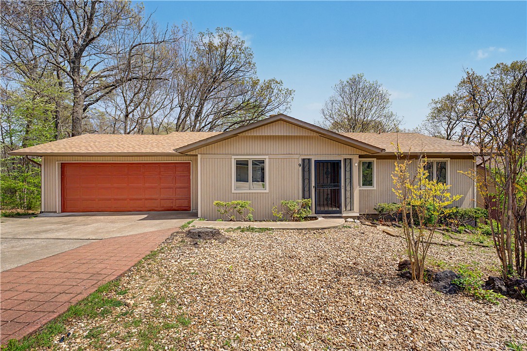 Completely refreshed and move-in ready, this peaceful home is tucked away on a quiet street while still offering easy access to all the amenities Bella Vista is known for. Recent updates include fresh interior and exterior paint, beautiful wood flooring, granite countertops, tile finishes, and stainless steel appliances throughout. The home features 4 bedrooms and 3 bathrooms, along with a finished walk-out basement that provides a spacious second family room, bonus room, and abundant storage. Enjoy outdoor living on the large covered deck, perfect for relaxing or entertaining. Additional highlights include a 2-car garage and a functional layout designed for everyday comfort. Located in the Bentonville School District, this home offers a great blend of privacy, space, and convenience.