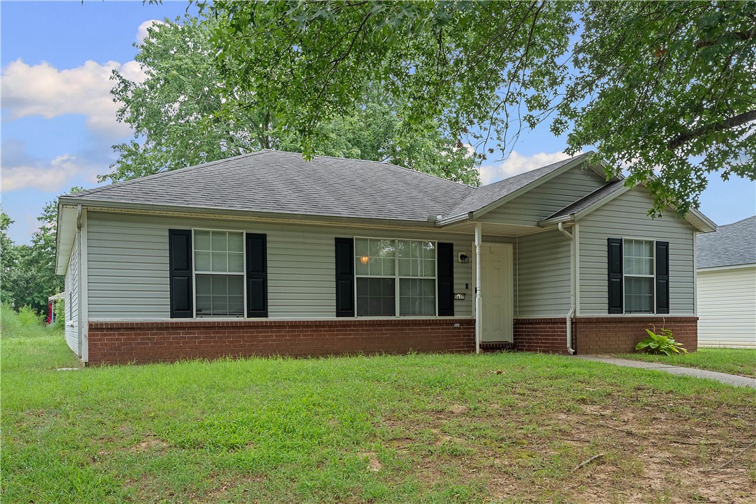 Great location! This West Fayetteville home has 3 bedrooms & two bathrooms.  There is a newer walk-in shower in the main bathroom. The back patio is in the fenced area off of the garage & is shaded by a large maple tree. HVAC system was replaced 4 years ago.  No carpet! Refrigerator, washer & dryer convey with the home. You will fall in love with this quiet, established neighborhood.