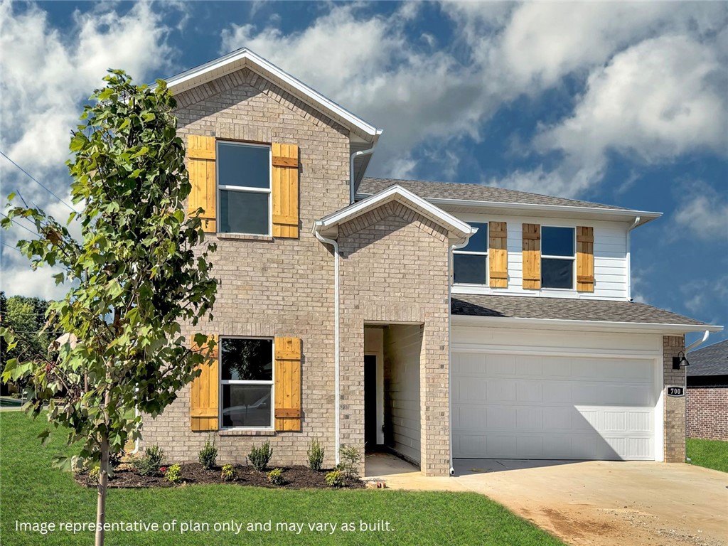 The Miraculous Mitchell plan in The Element, in beautiful Fayetteville, AR! This home offers 4 bedrooms and 3 full bathrooms! Upon entering, you’ll find a spacious living room and kitchen with a dining room! The kitchen features beautiful quartz countertops, a gas range, and pantry. The primary bedroom and ensuite are located on the first floor. The primary bath features quartz countertops with double sinks and a walk-in shower! Upstairs, you’ll find a game room, perfect for entertaining along with bedrooms 3 & 4 with another full bathroom! Each home will have LVP flooring throughout the first floor, with carpeted stairs and carpet in all upstairs living areas. Upstairs wet areas will have LVP flooring. The exterior will feature brick and siding per plan and a covered patio per plan. Homes in this neighborhood are equipped a programmable thermostat which allows you to effortlessly control your environment with the touch of a button. Landscape package! Garage Door opener! Taxes and parcel number TBD.
