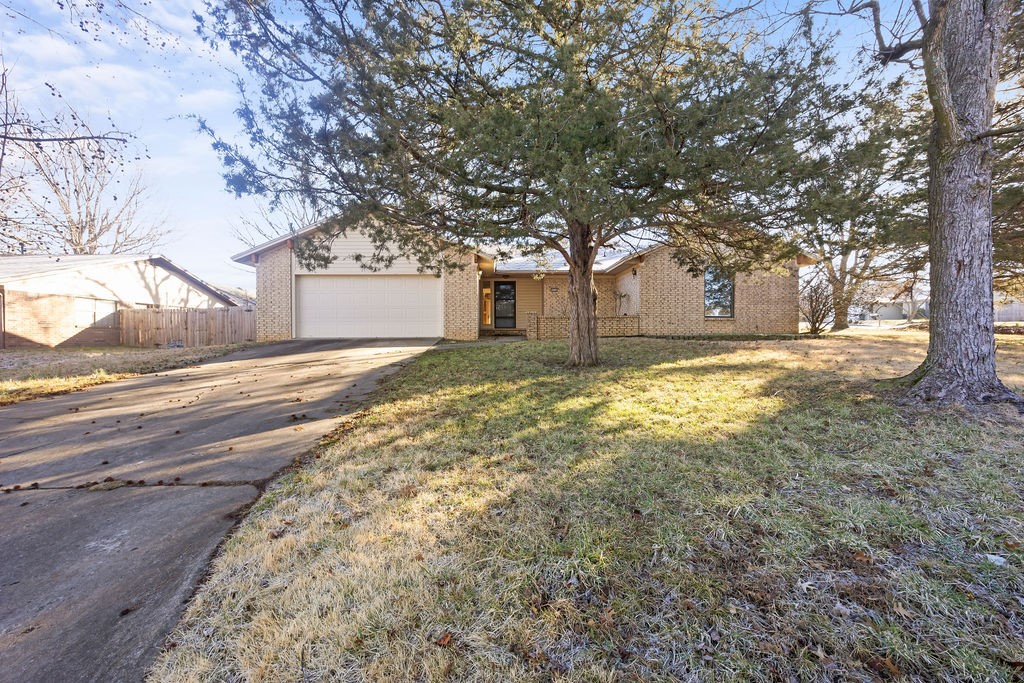 This well-maintained home offers the perfect combination of comfort, convenience, and location. Seller willing to pay buyers closing costs! Great corner lot less than 5 minutes to Gulley Park for the kids and trails to bike/walk/run on! Enjoy peace of mind with newer water heater, furnace and roof. Come see the stainless steel appliances, big farmhouse sink, and washer/dryer included in the sale. If you have any pets, let them enjoy the fully privacy fenced backyard with a covered patio and fire pit! Attached two car garage with attic storage. Close to great restaurants and 5 minutes to the Walmart neighborhood market! Beautiful marble waterfall countertop in kitchen. Around 10 minutes to the University of Arkansas. Currently occupied. Please do not disturb tenant. Don't miss your opportunity to own a home in one of Fayetteville's most desirable and convenient locations! Agent Owned. Schedule your showing today.