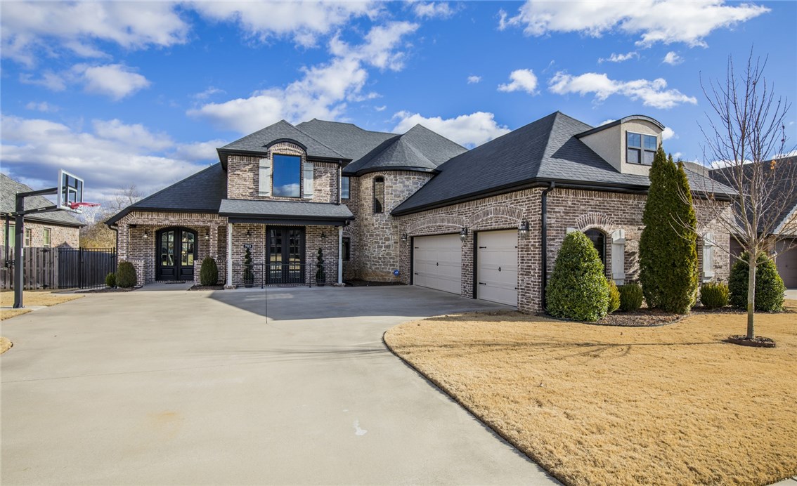 Check out this Immaculate Entertainers dream home featuring 5 bedrooms and 4.5 baths with bonus room and bar room. Lower level features Master bedroom with bathroom that connects to Laundry room,, 2nd bedroom with private bath and Formal dining room. 2nd level features 3 bedrooms with 2 full baths (1 en-suite) + bonus and bar room. Oversized insulated garage features extra storage area and safe room. Back patio features covered dining space + built in bar area. Yard space is already over a 1/4 acre but you also have access to another 1/4 acre outside of fenced area. Other features include 2 Tankless water heaters, Softclose cabinets in Master bathroom and kitchen, sprinkler system and side load garage.