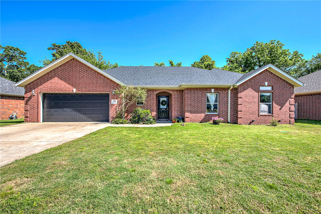 Wonderfully maintained Springdale beauty with hardscaped backyard sanctuary! Living area features vaulted ceiling and cozy gas fireplace, with fresh paint extending into the dining room, den, playroom, and primary suite. A sunny breakfast nook sits off the kitchen, and a versatile fourth bedroom easily adapts into an office or media den. The primary bath includes a walk-in shower and tub.

Major upgrades provide peace of mind: new roof and privacy fence (2026), cleaned septic system (2026), dishwasher (2024), HVAC system (2023), garage system & door (2022).

Outside, the fully fenced backyard is designed for entertaining, featuring an impressive hardscaped patio with a built-in outdoor cooking area, stone firepit, and a spacious half-circle bench.
