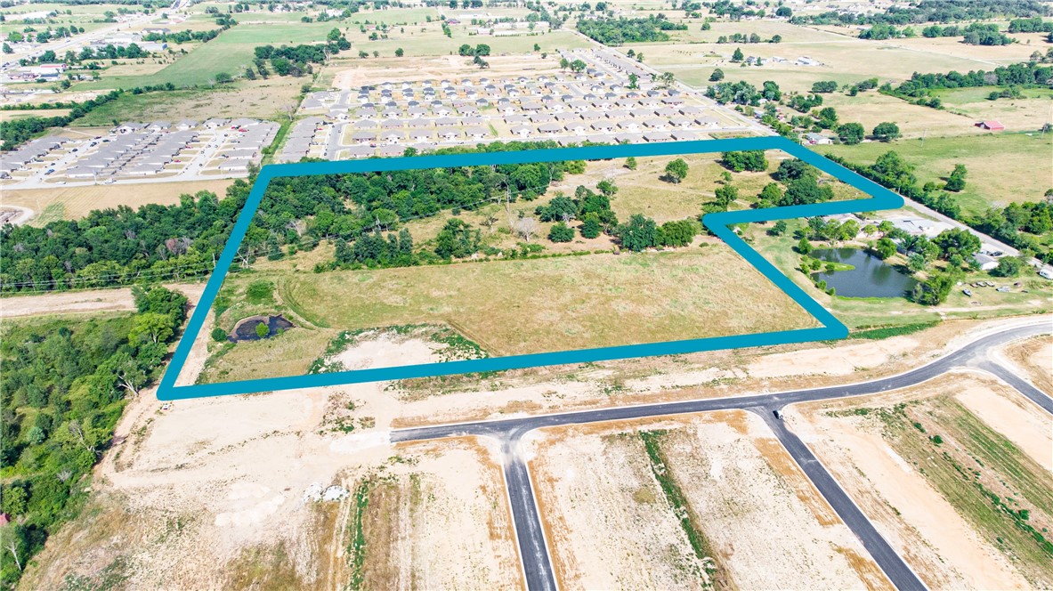 This property is ideal for development, as it is within the city boundaries and has electricity, water and sewer services available. The land is flat and can be easily reached from Hwy 412. The property is located at the end of Timothy St, which is 0.2 miles long, and has more than 500ft of frontage on E Kenwood street. There are new developments on the west side and newer duplexes on the east side. The current zoning is A-1, which can be rezoned to single-family or multi-family residential. A good way to use the property would be to build multi-family units and use the electric easement as a road, parking area or green space. This is a rare chance to own a large piece of land with endless possibilities!
