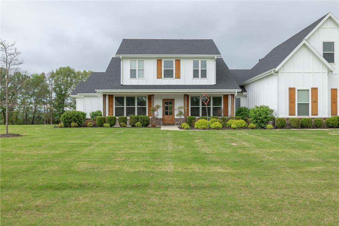 Stunning home on 2.42 acres with White River frontage, offering quality finishes & exceptional indoor-outdoor living. An open layout creates an inviting flow, centered around a gas fireplace & complemented by wood flooring, built-ins, fresh interior paint & updated lighting throughout. Kitchen boasts quartz countertops, gas range with vent hood, large island, walk-in pantry & double oven, ideal for everyday living & entertaining. Primary suite offers a spacious retreat with a large walk-in shower, while all additional bedrooms have private ensuite baths. Additional features include a dedicated office, formal dining & a wine bar/butler’s pantry with beverage fridge, along with a laundry area equipped with a sink & drop zone with hooks. Outdoor living features a screened-in porch with automated screens, extended patio, fire pit & hot tub, 3-car attached & 2-car detached garage.  The bonus room above the garage can serve as a 5th bedroom, In-Law/Nanny ensuite or flex space as it includes a closet & Bath.