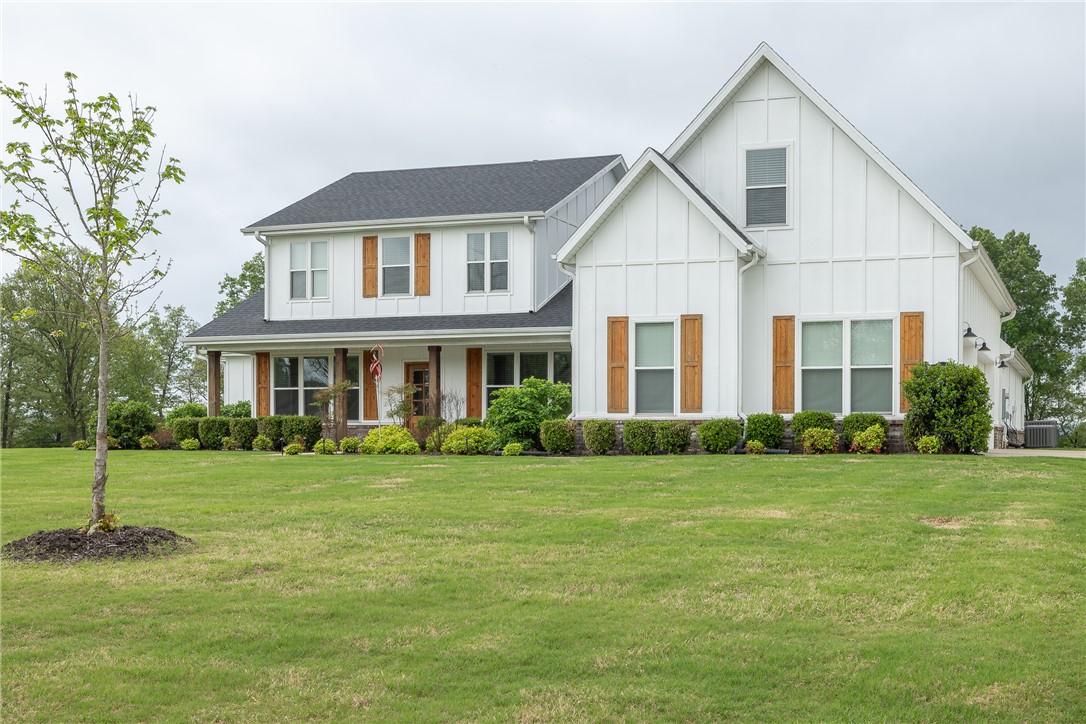 Stunning home on 2.42 acres with White River frontage, offering quality finishes & exceptional indoor-outdoor living. An open layout creates an inviting flow, centered around a gas fireplace & complemented by wood flooring, built-ins, fresh interior paint & updated lighting throughout. Kitchen boasts quartz countertops, gas range with vent hood, large island, walk-in pantry & double oven, ideal for everyday living & entertaining. Primary suite offers a spacious retreat with a large walk-in shower, while all additional bedrooms have private ensuite baths. Additional features include a dedicated office, formal dining & a wine bar/butler’s pantry with beverage fridge, along with a laundry area equipped with a sink & drop zone with hooks. Outdoor living features a screened-in porch with automated screens, extended patio, fire pit & hot tub, 3-car attached & 2-car detached garage.  The bonus room above the garage can serve as a 5th bedroom, In-Law/Nanny ensuite or flex space as it includes a closet & Bath.