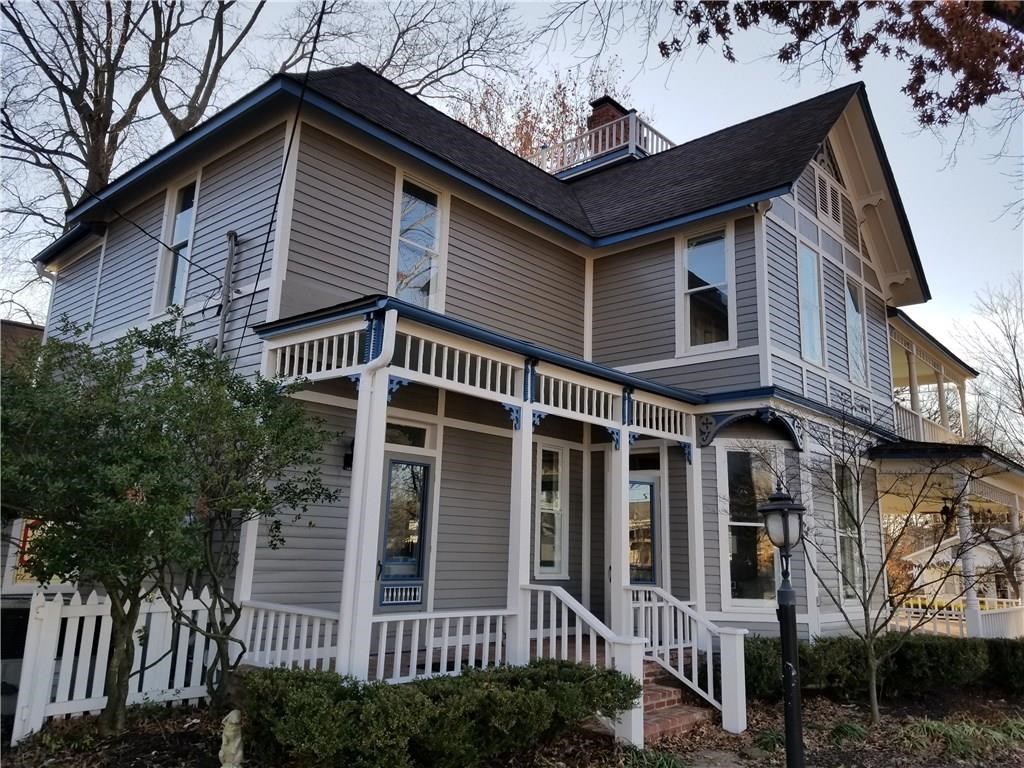 This historic home is just a few minutes walk away from everything downtown Bentonville has to offer. Quick access to the Razorback Greenway, Crystal Bridges, and many more outdoor adventures. It is great for entertaining large crowds with a beautiful formal dining room and open light filled kitchen. This home has a tremendous amount of character and history dating back to the late 1800's. Come sit on the porch and enjoy time with friends. You will fall in love because it is just a fun place to live.