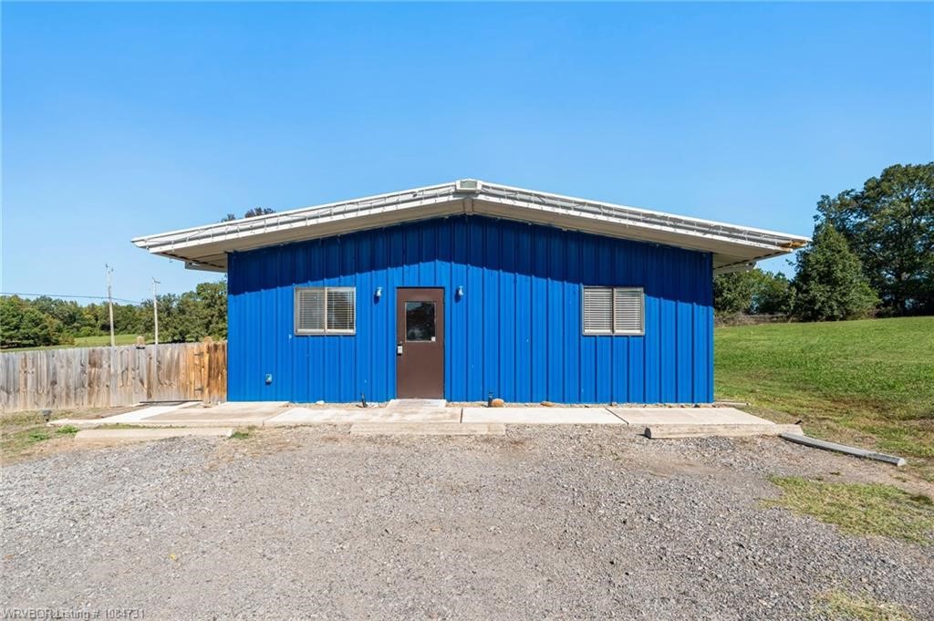 What an opportunity!! This recently updated building was recently used as a Day Care business with several rooms, kitchen area with appliances, an office, 3 restrooms and a fenced play area.  This building would be suitable for many different types of offices or retail businesses. There's so many opportunities to have that business you've always wanted and there's room for another building or parking.  Call your favorite realtor today and take a look!