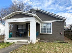 DOWNTOWN BUNGALOW! From the yellow front door, to the original hardwood floors, the vintage doorknobs, & the small garden in the backyard, this home is straight from a storybook! 2 beds, 1 bath, a spacious covered back porch, & charming details that are too good to miss.