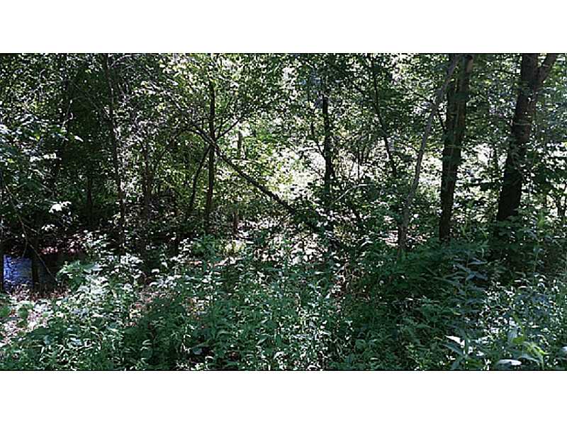 Wooded and very private area with a creek . The 9.91 acres is comprised of 2 smaller pieces of acreage that are not connected but share a single parcel number . Additional parcels available with up to 60 acres more or less , contact listing agent for more information .