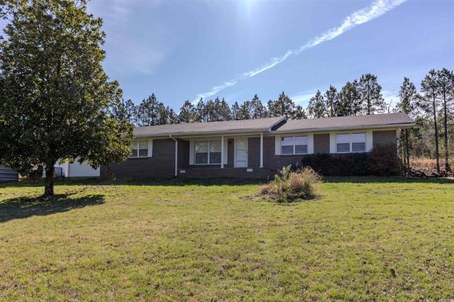 Country living at its finest on 13.03 beautiful acres! This property offers fenced pasture ideal for horses, cattle, goats, or sheep, completewith a loafing shed and a large pond. A prime homesite on the south side provides stunning views of Petit Jean Mountain. The homefeatures 4 bedrooms, 3 bathrooms, plus a versatile flex room and convenient indoor/outdoor storage space. The kitchen includesupdated appliances and a window overlooking the property. The roof and HVAC are newer. Outside, you’ll find a storage building withelectrical, an additional metal carport, and a rented propane tank that services multiple wall heaters for supplemental heat. Enjoy thecharm of the front porch shaded by mature magnolia trees, with seasonal blooms of tulips and irises scattered throughout the property.A rare combination of acreage, functionality, and scenic views—don’t miss this opportunity! Fiber internet is available here! Please note:property will be sold as-is.