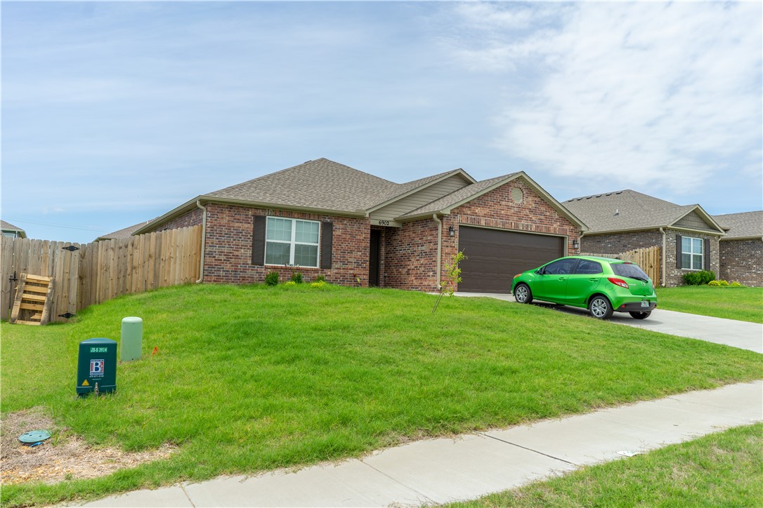 SW Bentonville near the Wal-Mart Distribution Center, 3 bedroom 2 bath house built in 2021!  Open floor plan with covered patio. Loads of natural light, spacious bedrooms, stainless steel appliances, LVP flooring throughout the kitchen/dining, living room and carpet in the bedrooms. Quiet neighborhood.  Tenant Occupied. Avail. 07/02/2022.  Please no dogs over 20lbs.