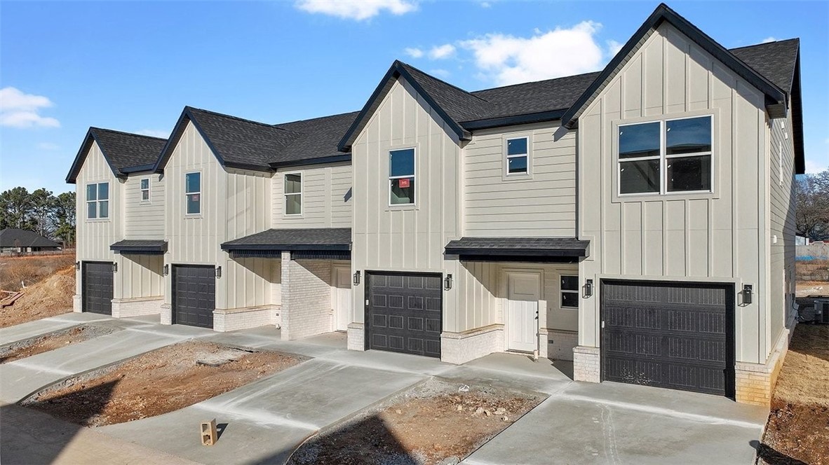 Welcome to Pea Ridge Pointe — where small-town charm meets modern living. Located in the heart of Pea Ridge, this new luxury townhome subdivision features 82 beautifully designed units that blend comfort, convenience, and community.

Each thoughtfully planned four-plex townhome offers over 1,500 square feet of living space, including three bedrooms and 2.5 bathrooms — delivering the perfect balance of style, functionality, and affordability. Premium upgrades include custom cabinetry, LVP flooring, quartz countertops, and built-in EV charging ports.