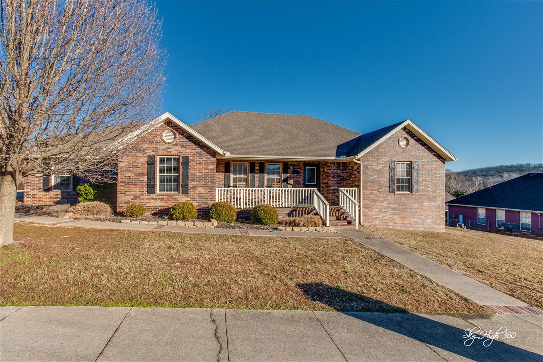 This beautiful corner lot home features an open kitchen with granite counter tops, stainless appliances and a large breakfast nook and dining area - perfect for entertaining! 
The master suite includes a double vanity, walk-in shower and large walk-in closet. 
This home also features a fenced in backyard, two-car garage and a massive deck with gorgeous views of the rolling Ozark hills. 
With quick access to I-49, you will be just minutes away from the heart of Fayetteville.