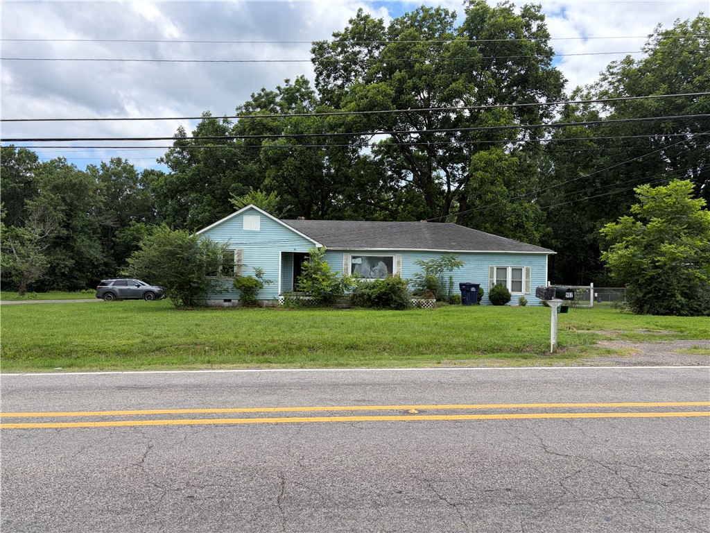 INVESTORS TAKE NOTICE!!! This 3 bedroom, 2 bath property offers great potential with a spacious lot and a workshop for added value.  Plenty of possibilities for investors, a fixer-upper project, or those looking for extra space.  Priced to sell.  Don't miss this opportunity!  HOME TO BE SOLD AS IS WHERE IS.
