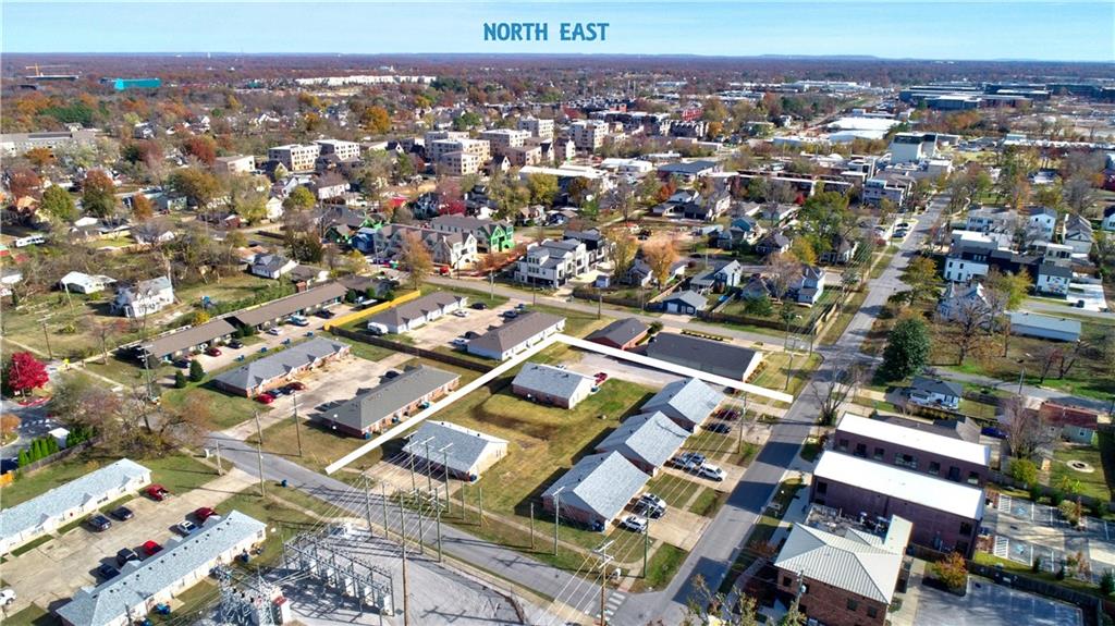This desirable property boasts over an acre in an incredible downtown corridor location with development potential. Already rezoned for downtown edge, and highly coveted, bring your dreams to life by being a part of the downtown Bentonville growth and future.