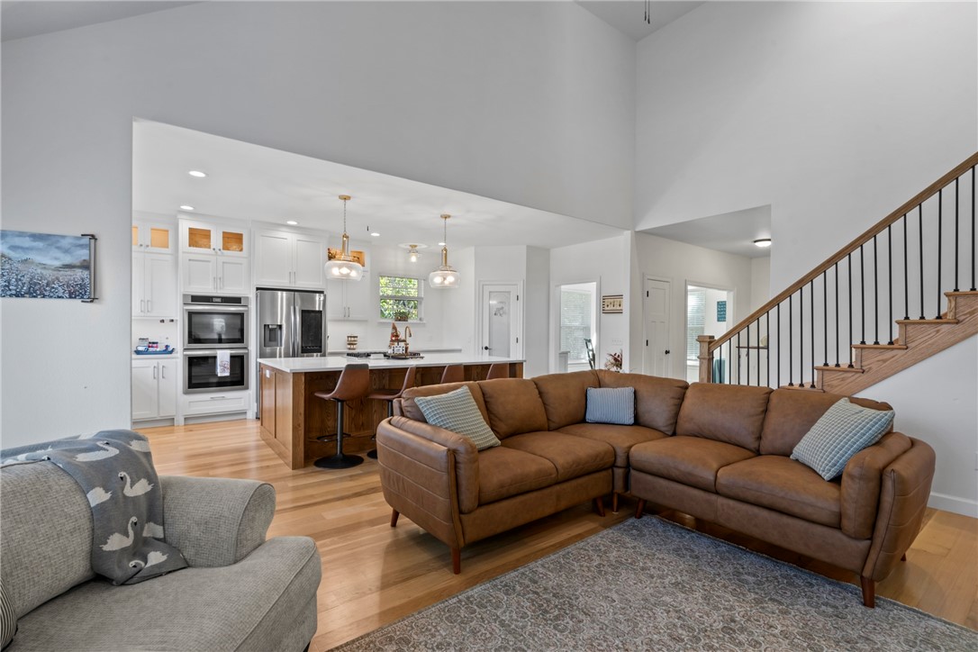 Beautiful country living in this renovated 3,500-square-foot estate, set on 3.5 acres with a short drive to Siloam Springs. Blending modern amenities with rural charm, this property offers spaciousness, privacy, and everyday convenience. Step inside to discover an open-concept living spaces, tall ceilings, and natural lighting. The updated kitchen is a chef’s dream, showcasing custom cabinetry, solid-surface countertops, top-tier stainless steel appliances, and a generous island perfect for hosting family and friends. Step into the primary suite with access to large back deck, complete with a spa-inspired bathroom featuring dual vanities, a walk-in shower, and 2 oversized closets. With five bedrooms, four and a half bathrooms, and a finished basement equipped with its own kitchenette, this home offers exceptional flexibility for guests, multi-generational living, or entertaining guest. Outside the 3.5-acre lot invites gardening, recreation, or anything you can imagine.