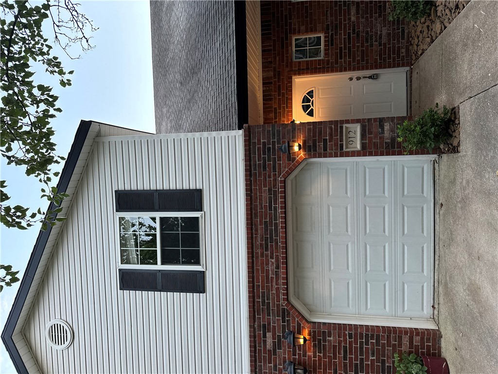 Well maintained, Wood Ave. Condo in prime Fayetteville location! 2-bedroom, 2.5-bathroom, Two-story Condo.  Only ~1.7 miles from the University of Arkansas, nearby Walker Park and all that Fayetteville has to offer. Established rental with tenant in place for investor looking to add to their portfolio, or could be great opportunity for Parents to establish off-campus student housing.  

The home features a 1-car garage plus one extra off-street parking spot. Inside, you will find plenty of storage and large walk-in closets in both bedrooms. The main bedroom has a large en-suite bathroom.  Both bedrooms and full bathrooms are located upstairs.  Downstairs features a guest half bathroom, kitchen with all appliances to convey, private laundry room with access to garage, eat-in dining room, and a spacious living room with access to the private back deck.