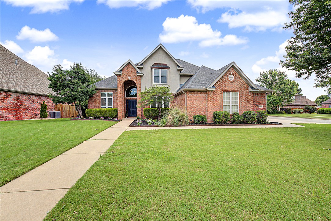 This is it!  Don't miss this beautiful, corner-lot home in the highly sought after Bent Tree neighborhood in West Rogers, conveniently located near shopping, dining, trails, parks, and many of Northwest Arkansas' most popular destinations. Inside, the open floor plan offers a comfortable flow for everyday living and entertaining, featuring built-ins, crown molding, a formal dining room, and a double-sided fireplace shared by the living room and the designated office. The kitchen is designed for both function and style with granite countertops, a center island, abundant cabinetry, and generous storage space. Step outside to enjoy the covered back patio complete with built-in speakers, a fully fenced backyard, sprinkler system, and storage shed. Thoughtful upgrades, versatile living spaces, and a central location make this home a must-see.
